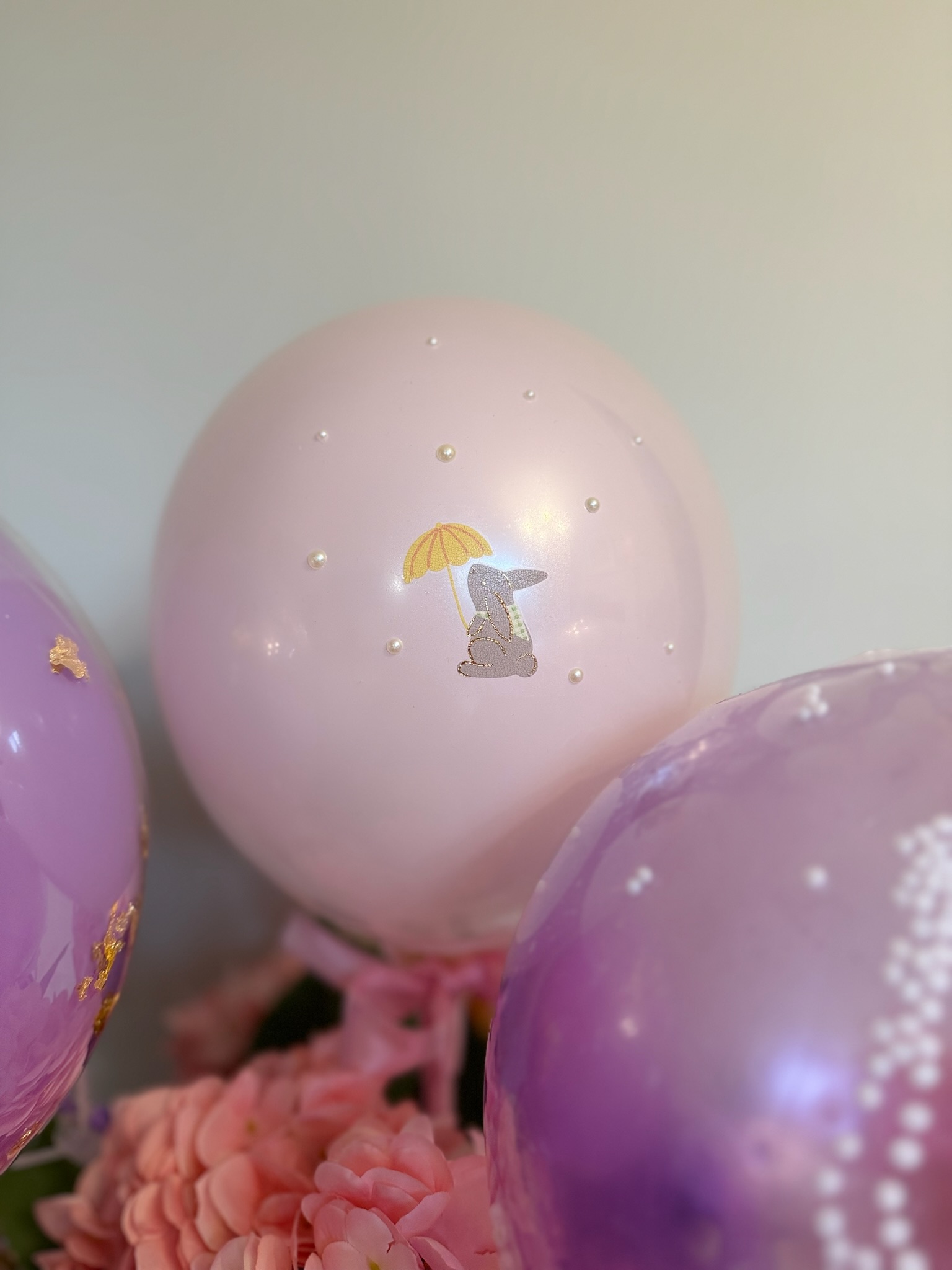 Blush pink balloon with bunny print detail