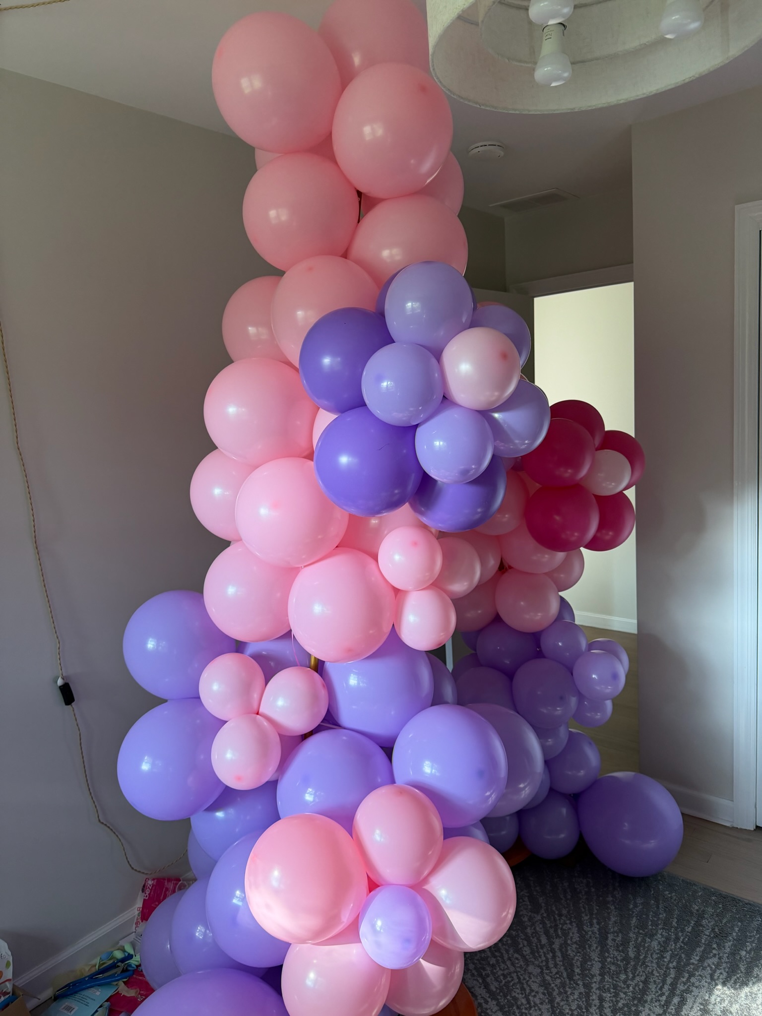 Pink and purple balloon column